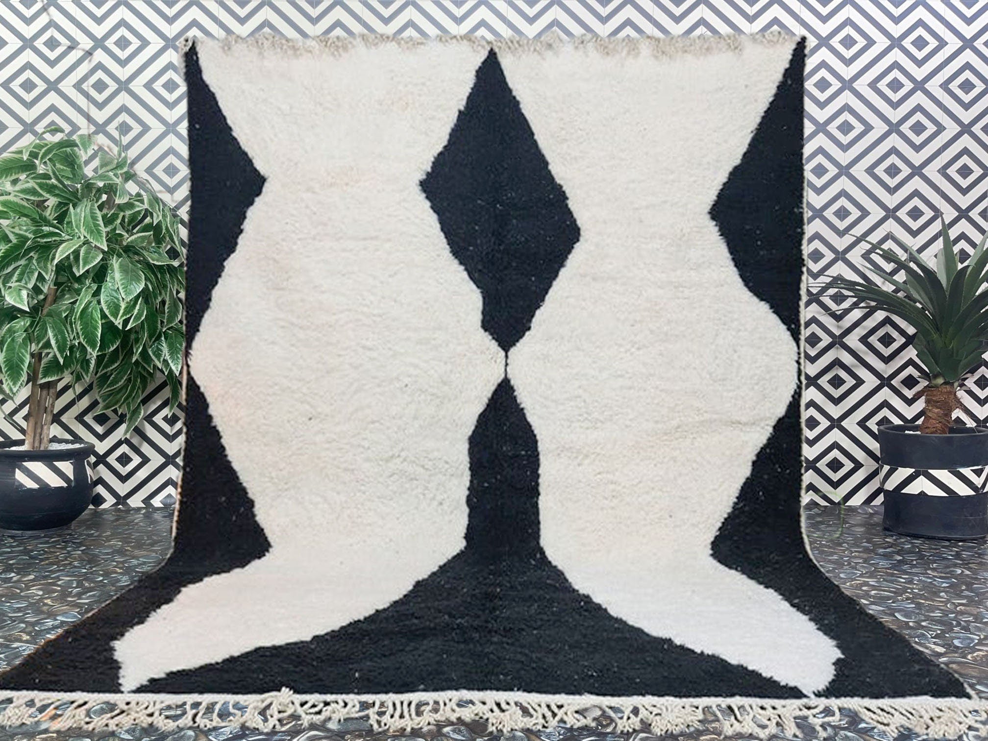 black and white geometric patterned area rug