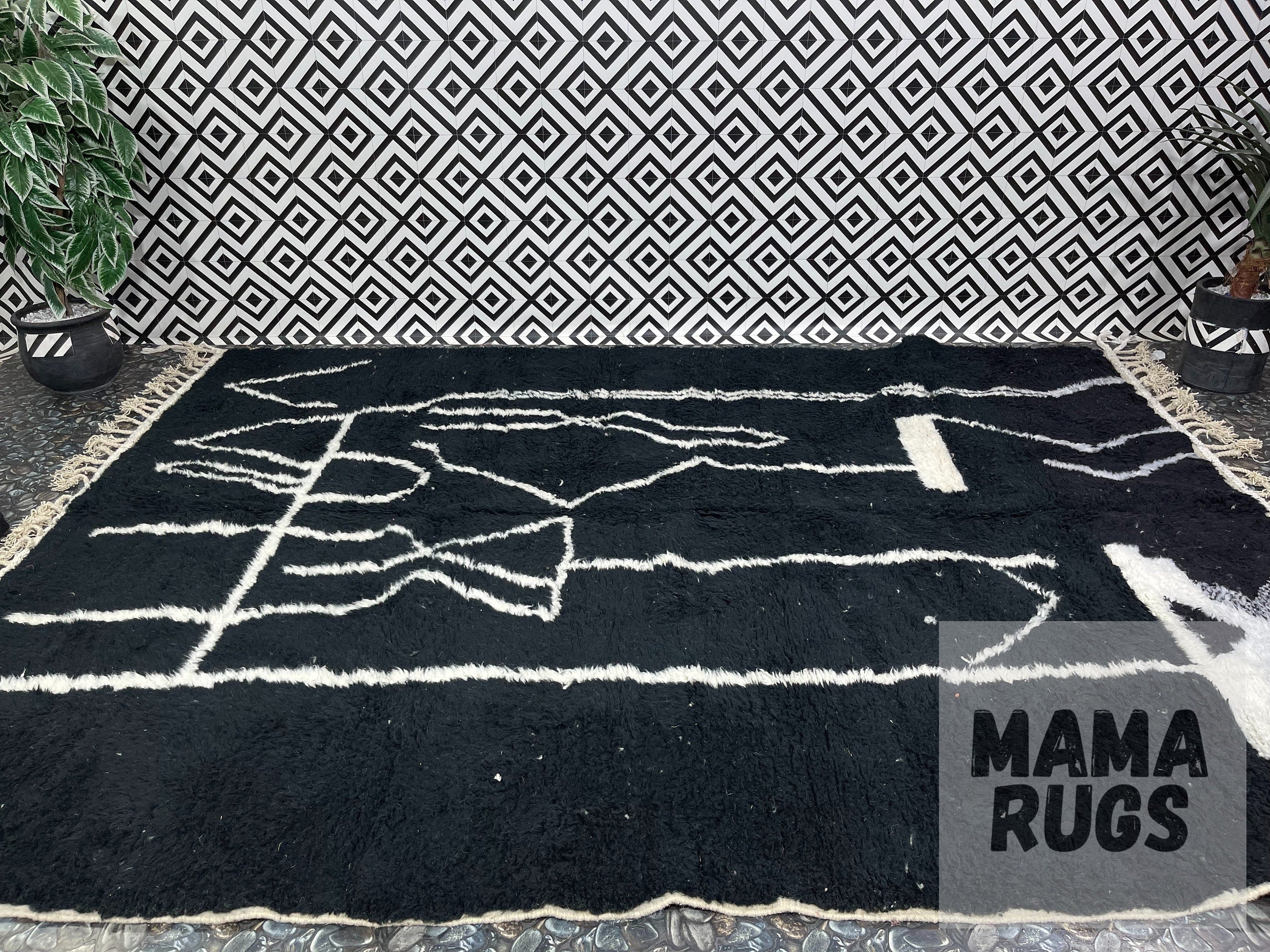 black and white patterned rug on floor