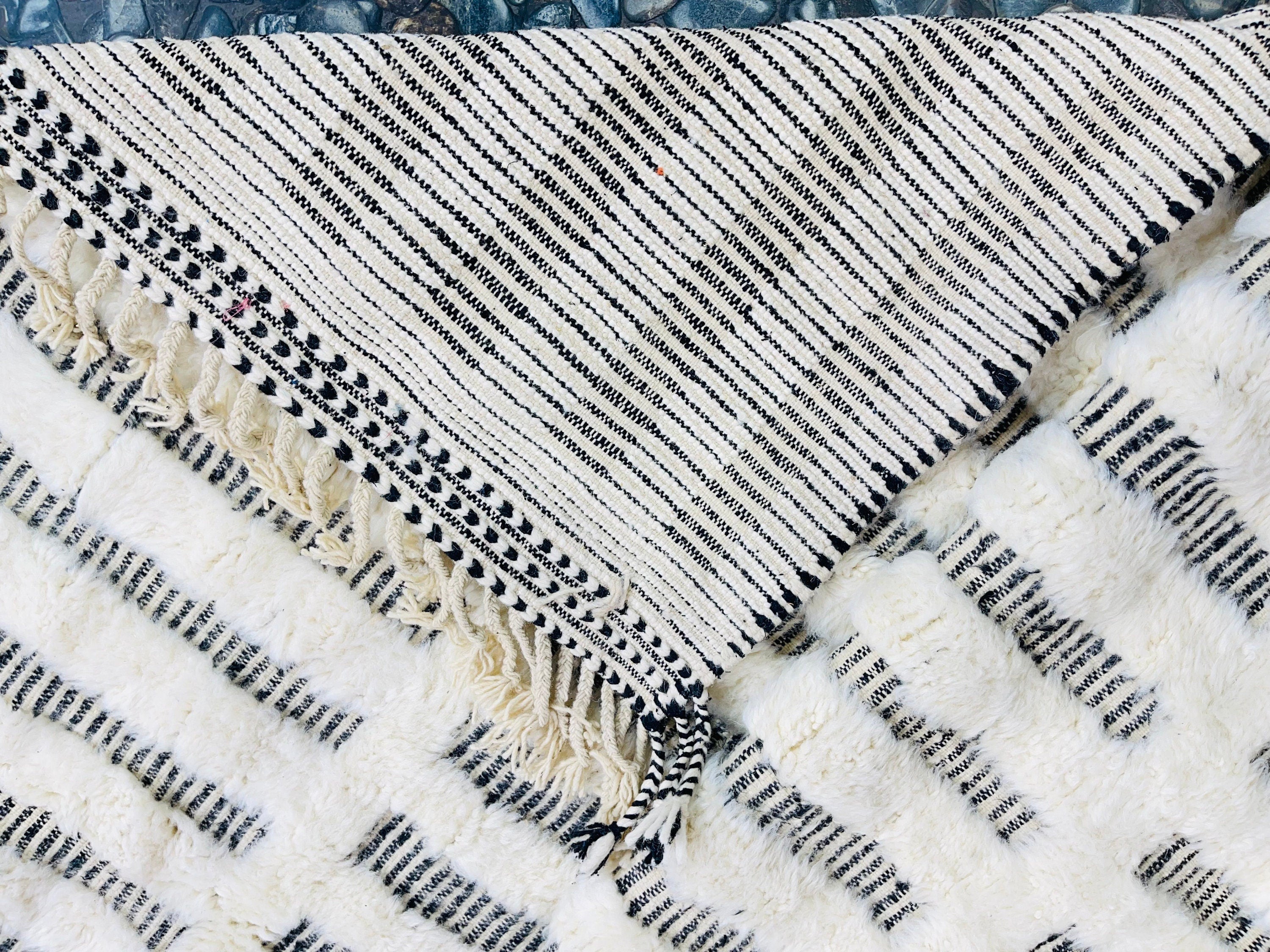 striped blanket with fringes and soft texture