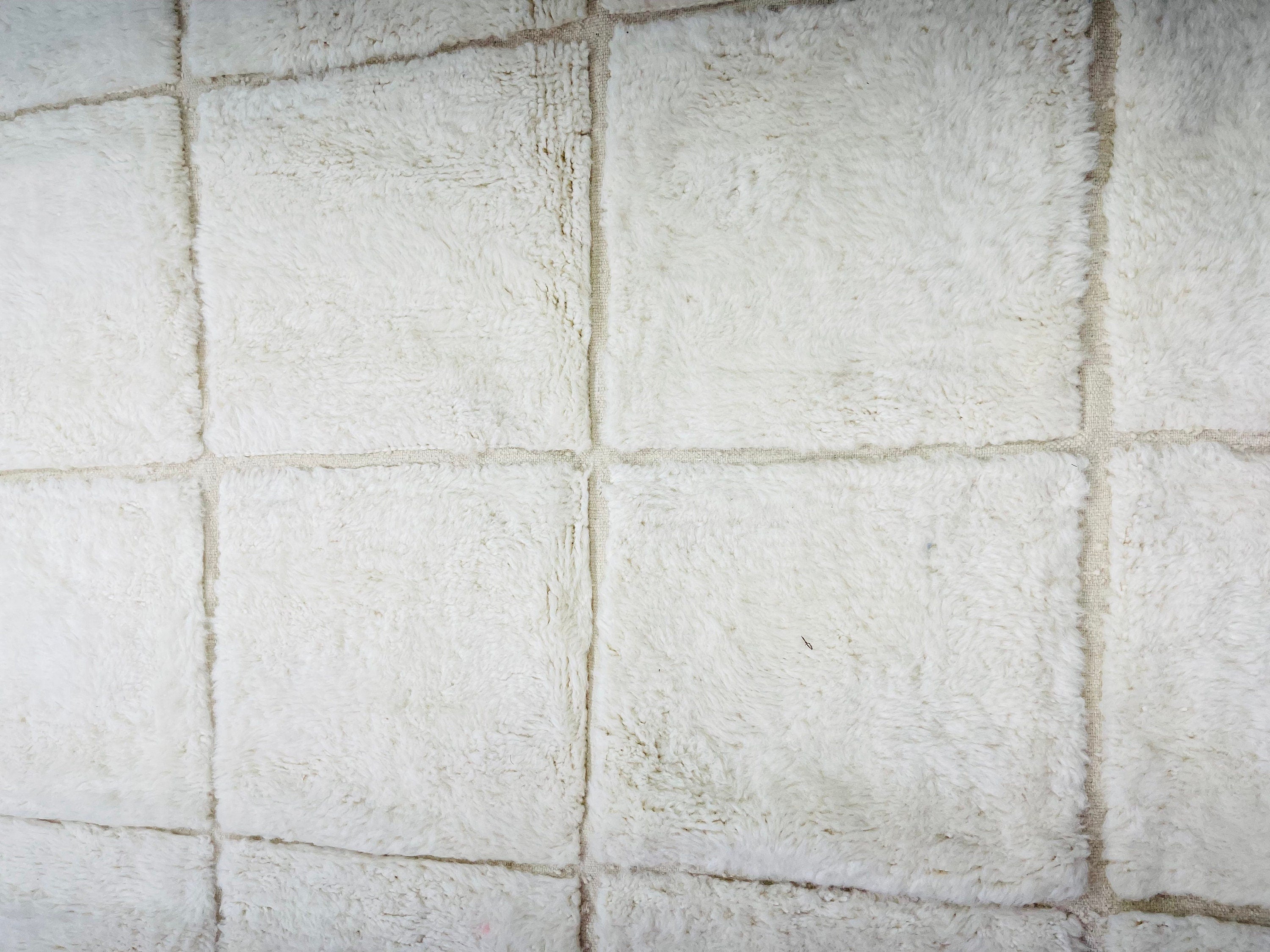 white fluffy textured wall with square pattern