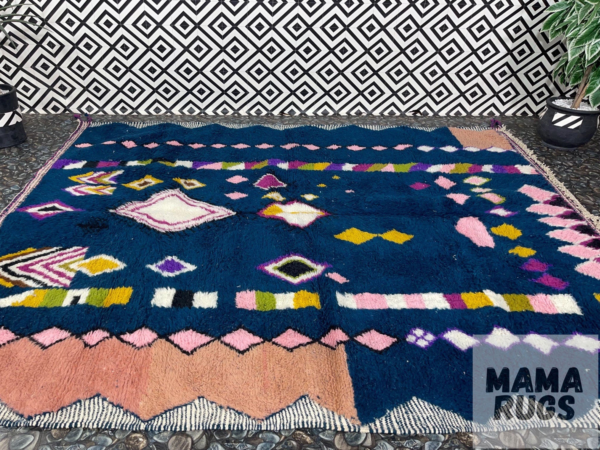 colorful rug with geometric patterns on floor