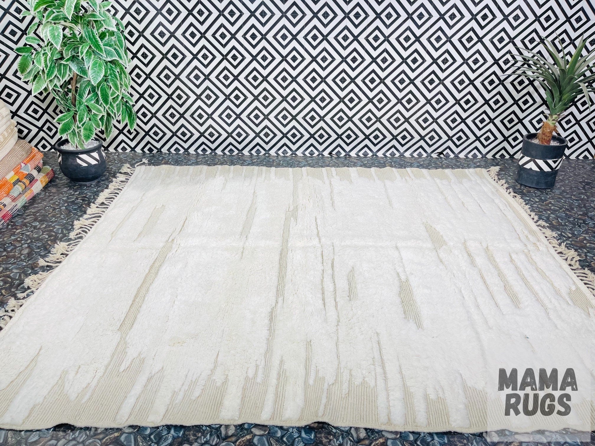 decorative area rug on textured flooring background