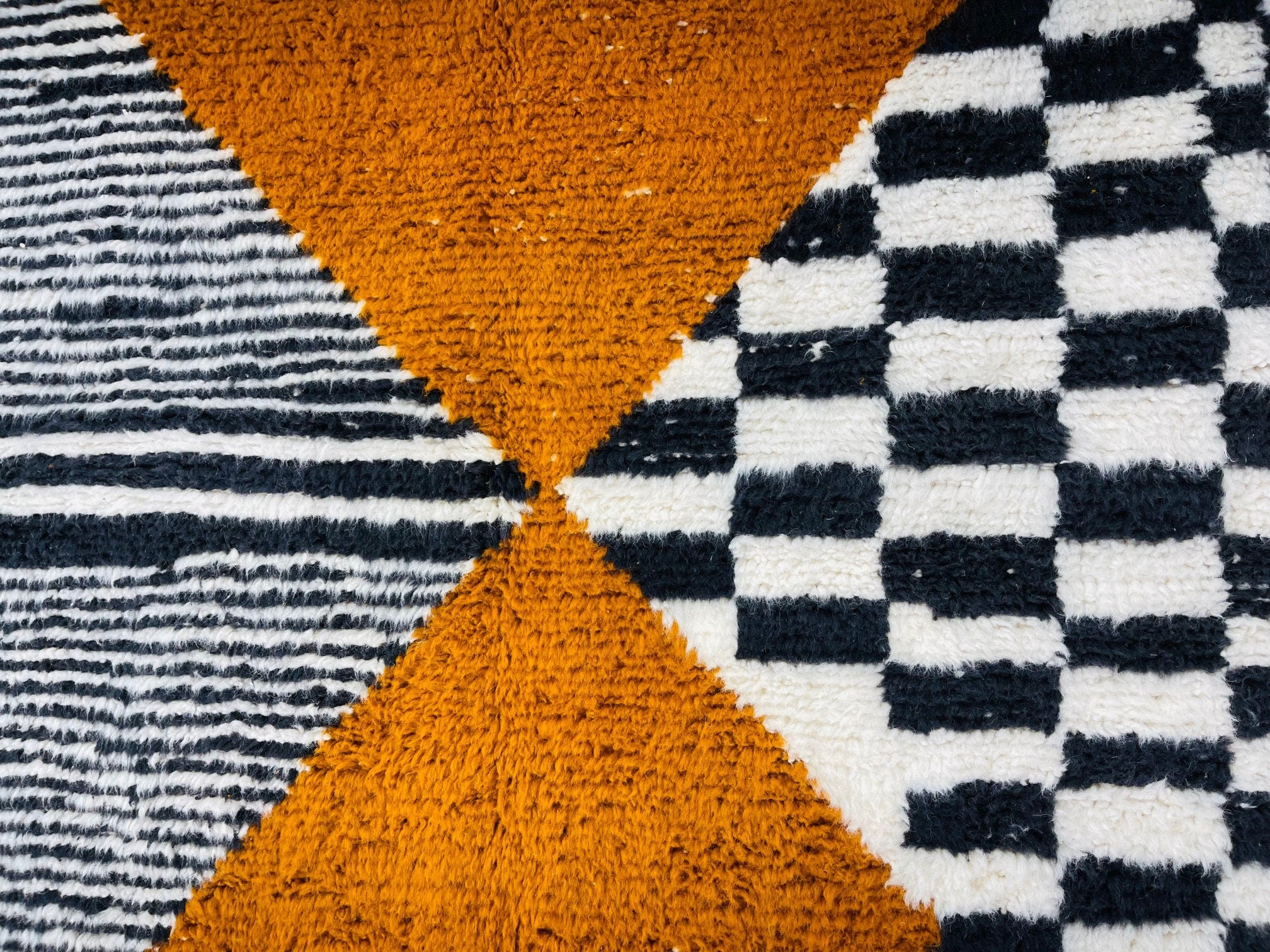 colorful geometric pattern rug in warm tones