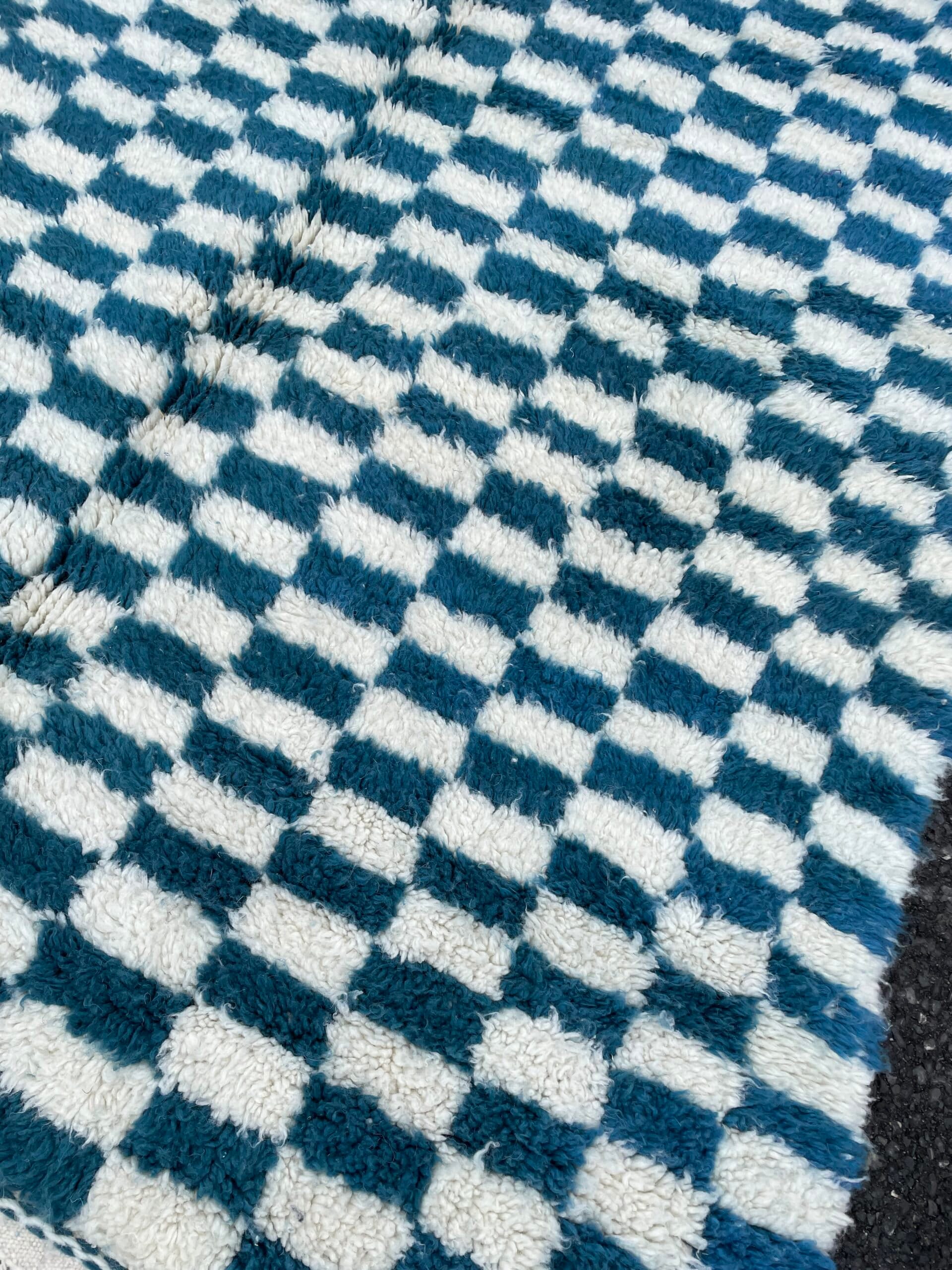 Blue and white checkerboard rug