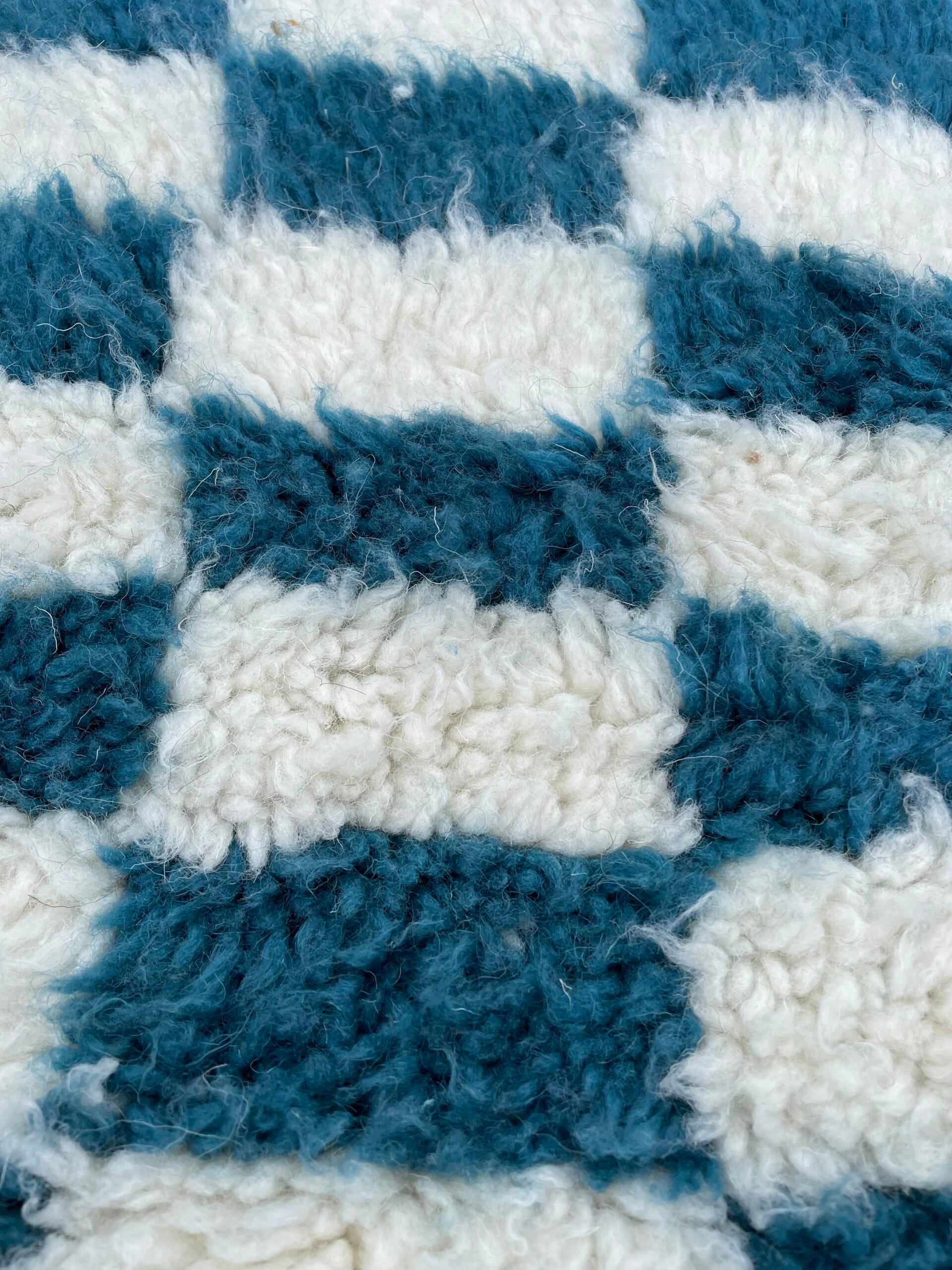 Blue and white checkerboard rug