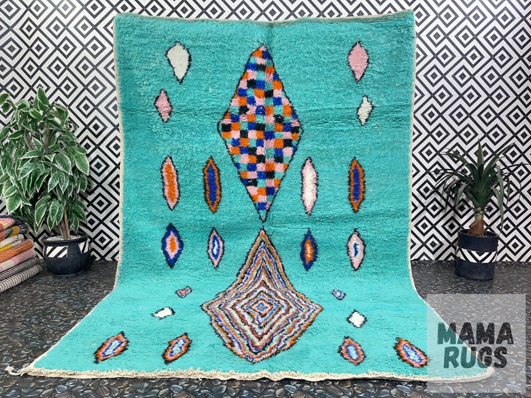 vibrant patterned rug against geometric background decor