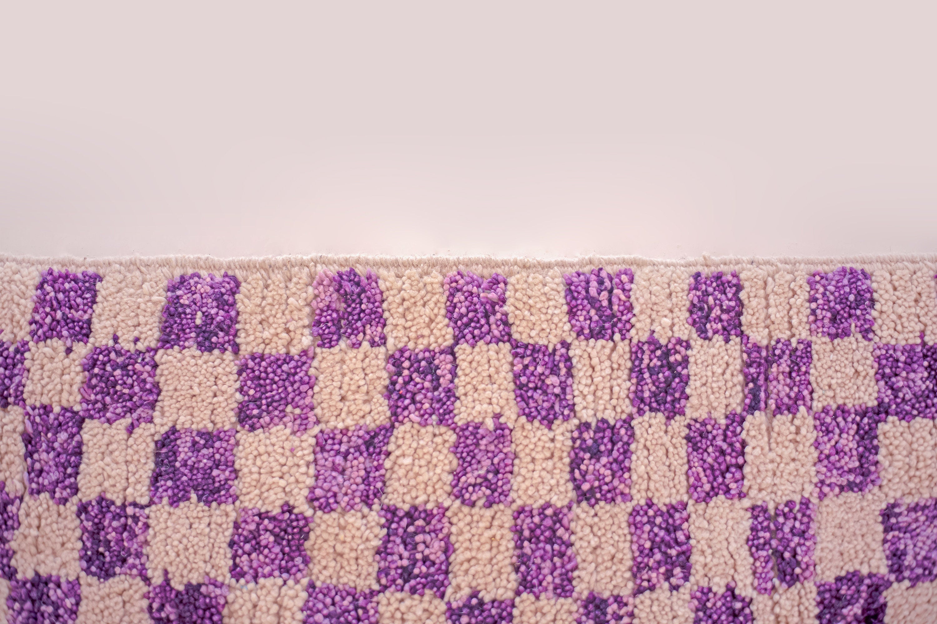 purple checkered rug with soft texture design