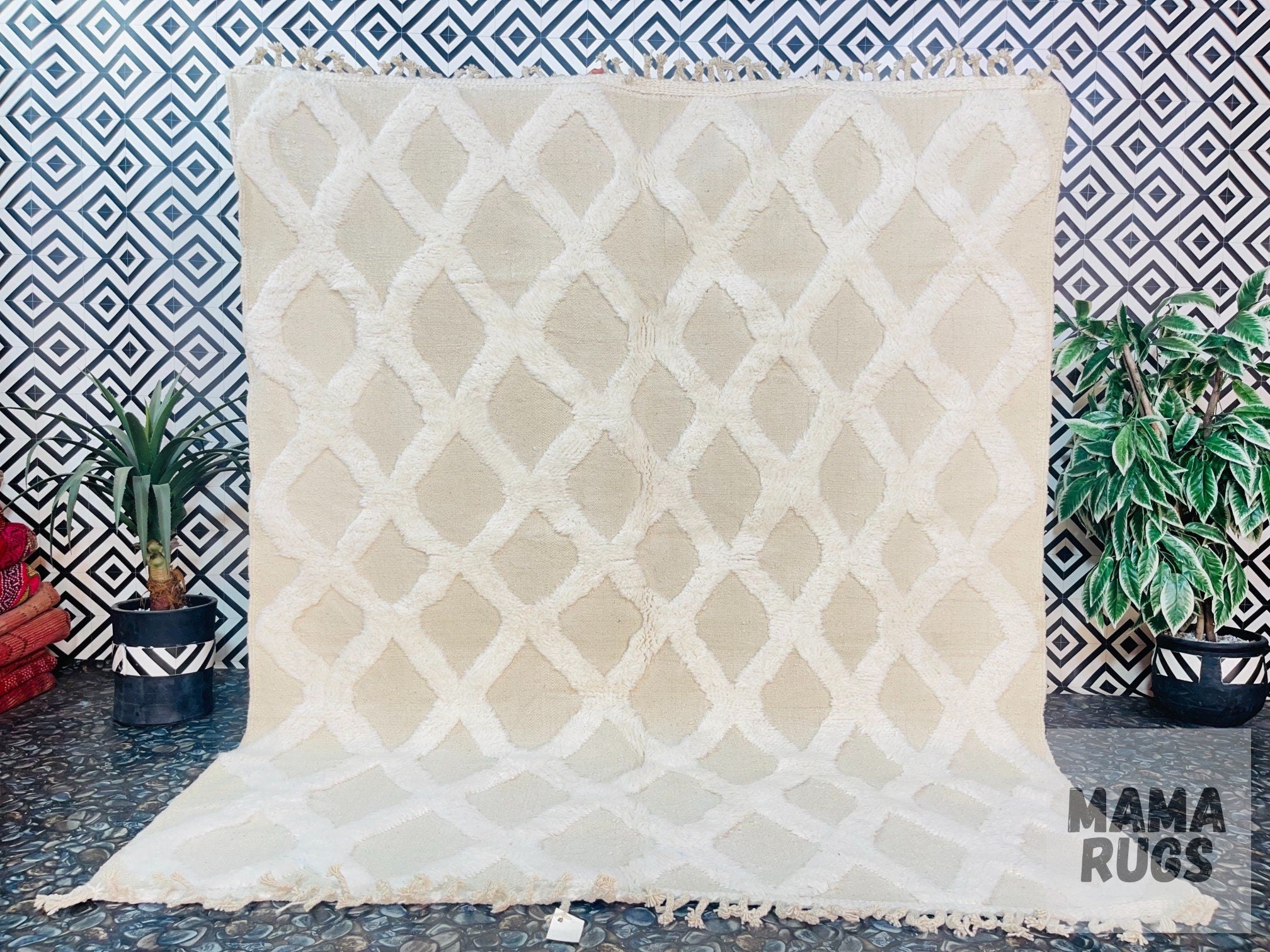 beige patterned rug on stylish floor backdrop