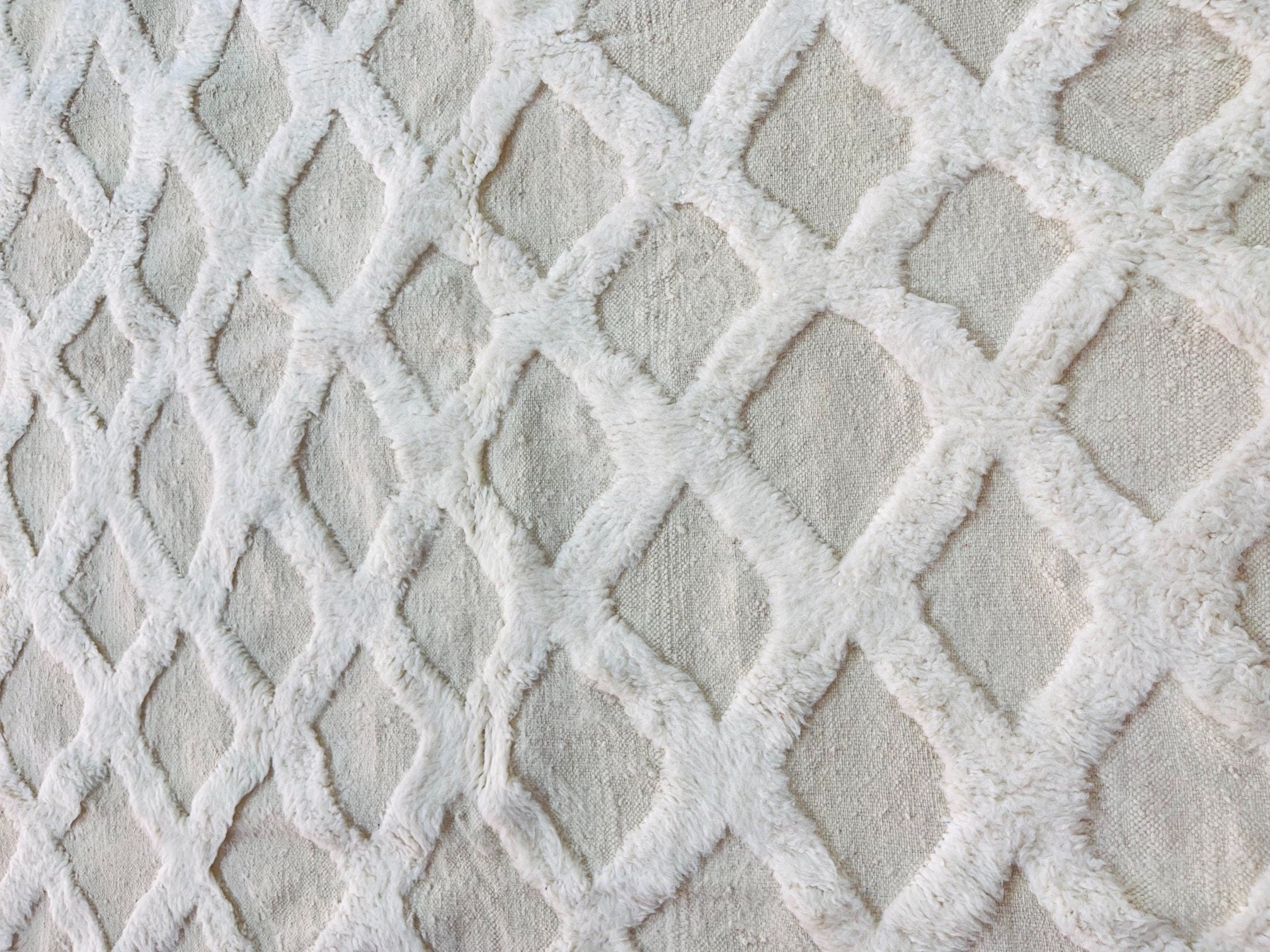 textured white fabric with diamond pattern design