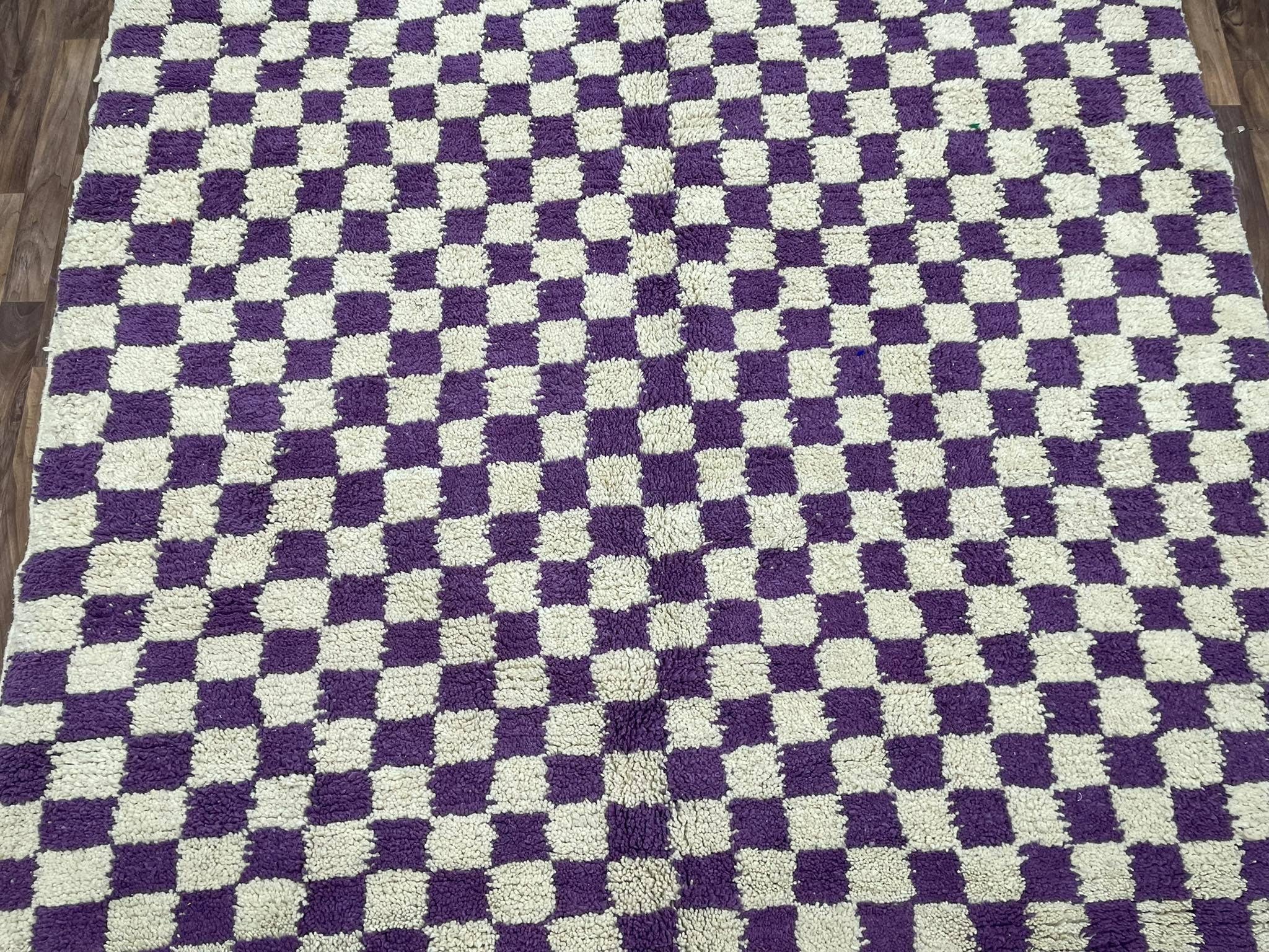 Purple and cream checkered rug, perfect for adding style and comfort to any room.