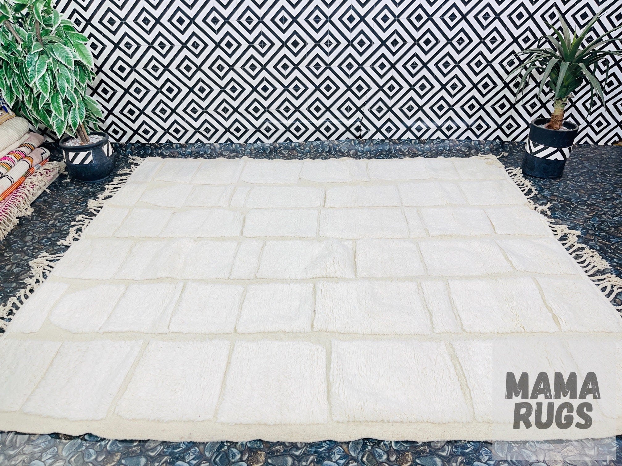 soft cream rug on patterned floor background