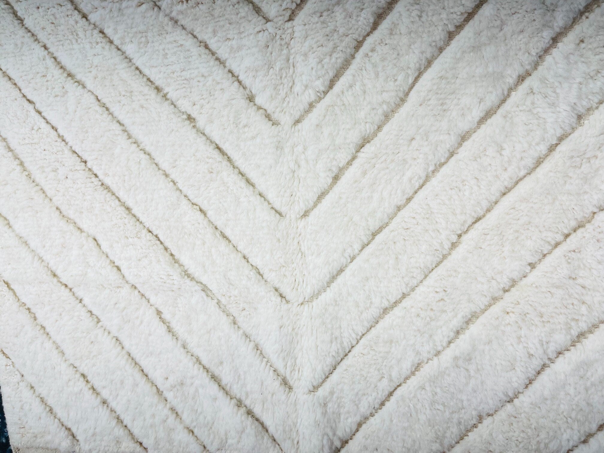 chevron patterned fluffy cream area rug textile