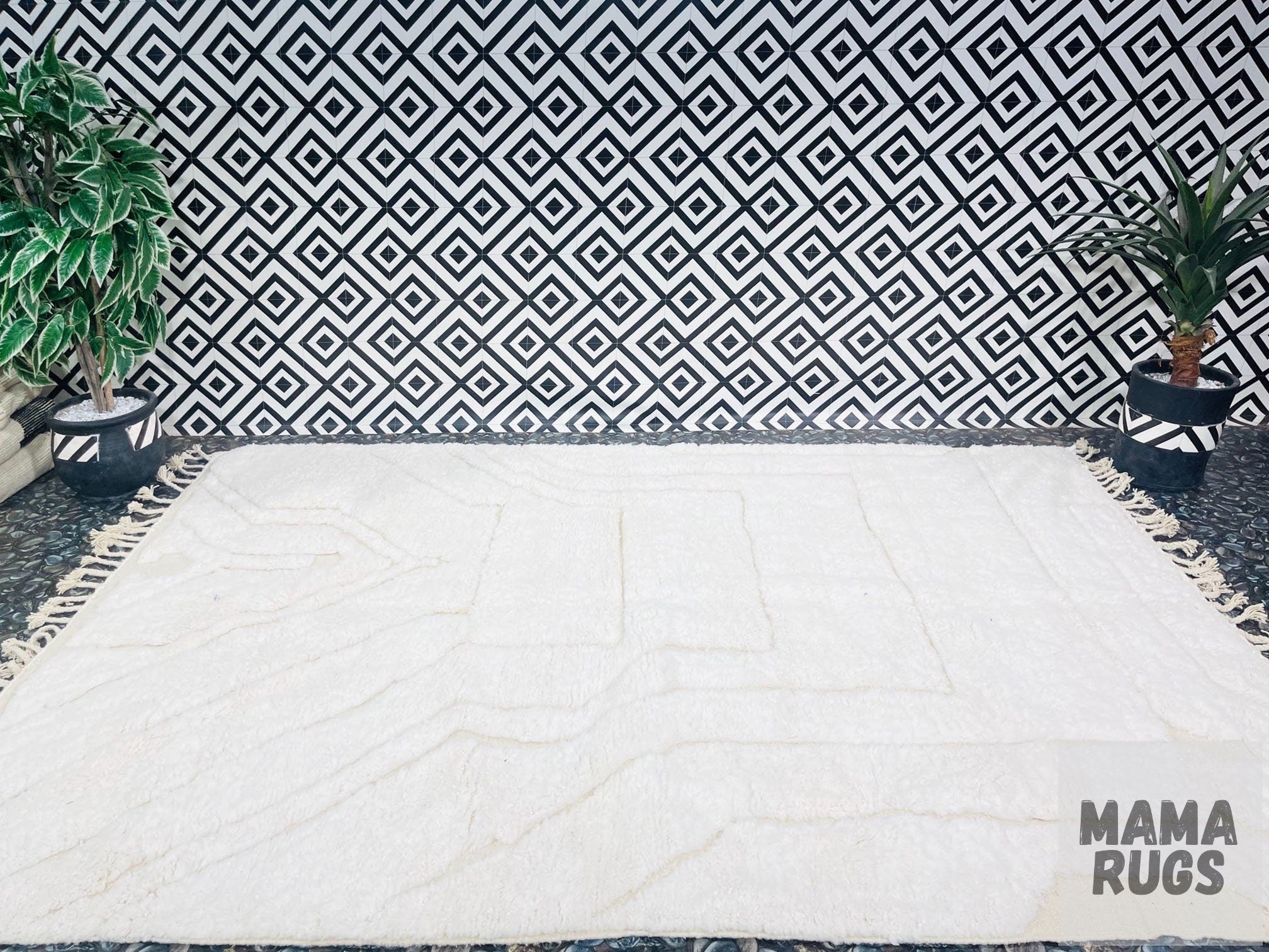 white rug on patterned black and white background