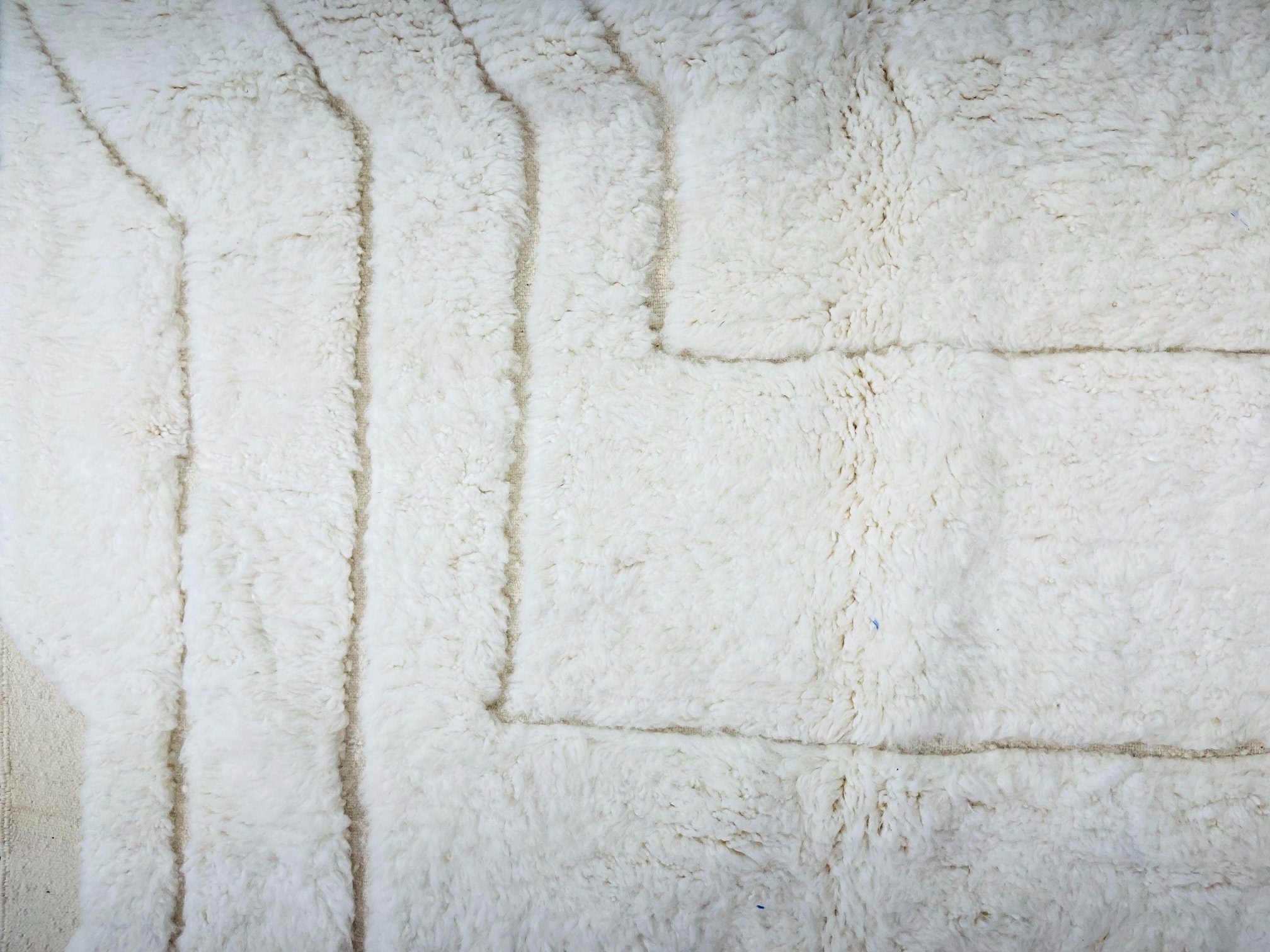 soft white fur textile with textured patterns